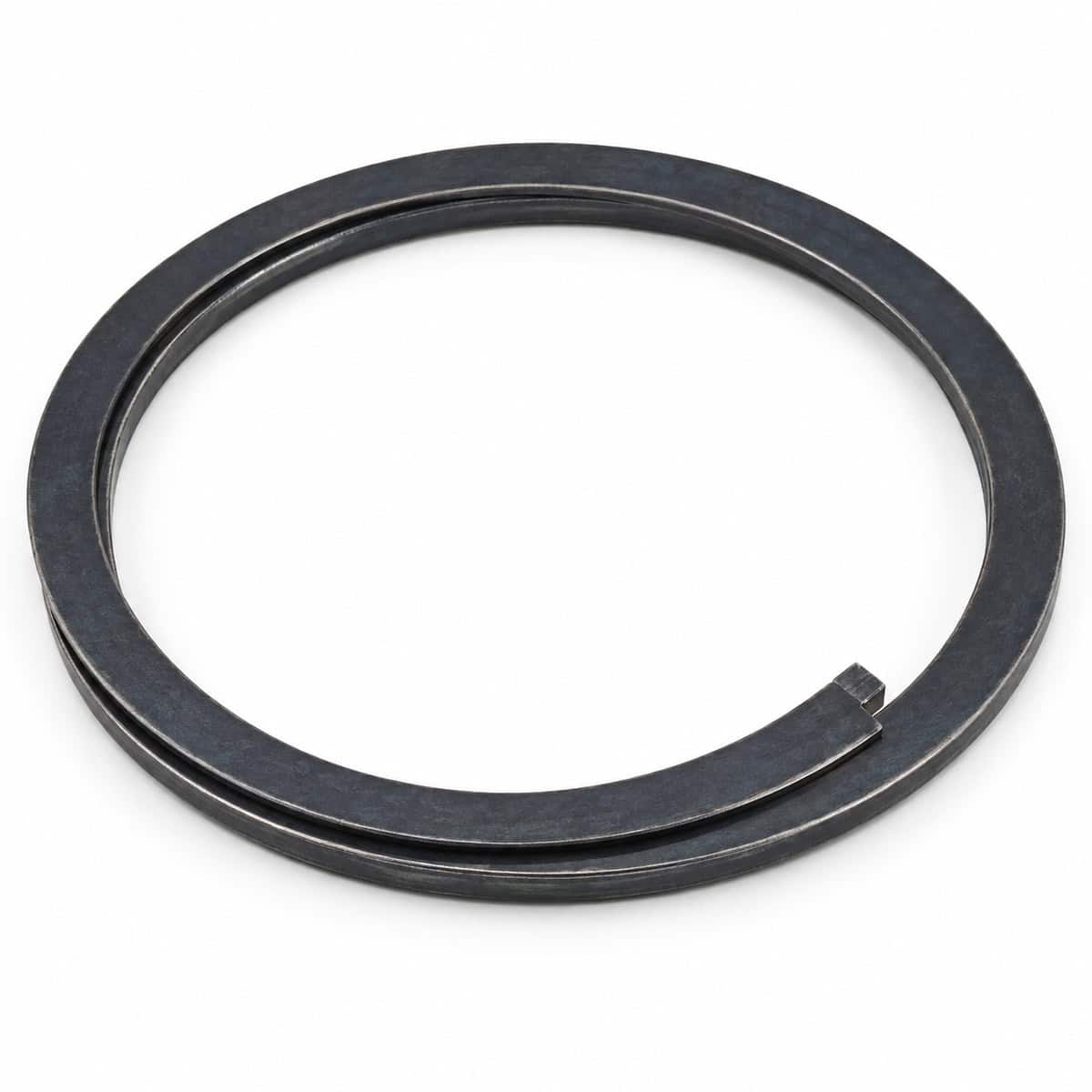Close-up of a black rubber ring retaining for industrial use.