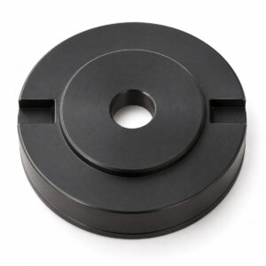 Black plastic cap with central hole for spray equipment.