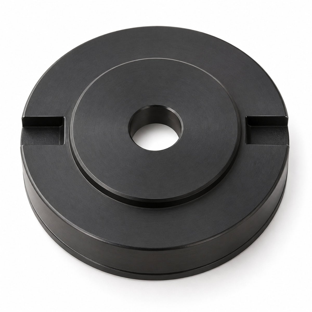 Black plastic cap with central hole for spray equipment.